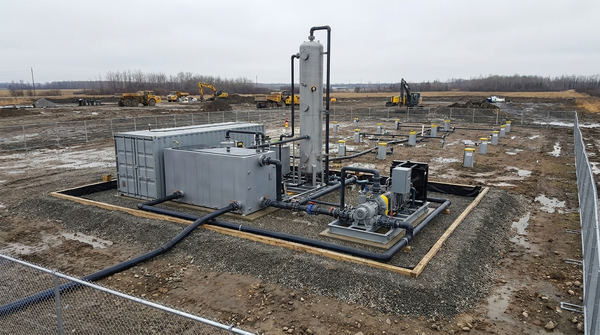 Mobile containerized water treatment system with air stripping tower deployed at a Canadian contaminated site remediation project
