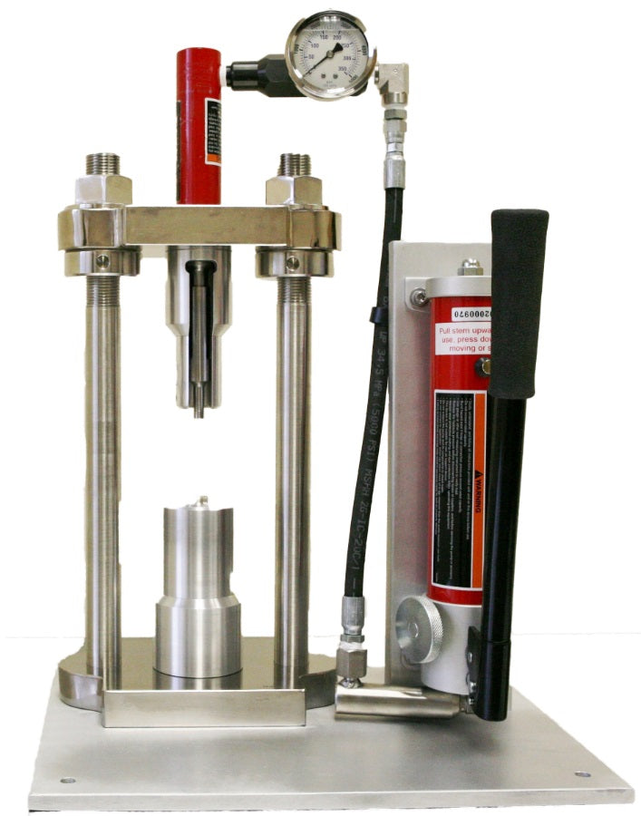 Source: qaqclab.com (BigCommerce reseller) sells this as the Unit Dose / UD Tablet Maker by Sampling Systems. Image show